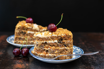 Fresh homemade sugar free carrot cake on dark vintage background