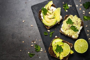 Avocado sandwich with seeds and cream cheese.
