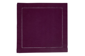 Closeup of a violet napkin or tablecloth isolated on white background. Kitchen accessories.