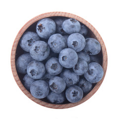 heap of blueberry in wooden cup isolated on white background. top view