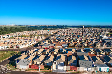 Fototapeta premium Aerial view of standardized houses of the Minha Casa Minha Vida Program of the State of Sao Paulo, Brazil