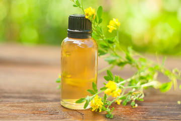 burclover essential oil in  beautiful bottle on White background