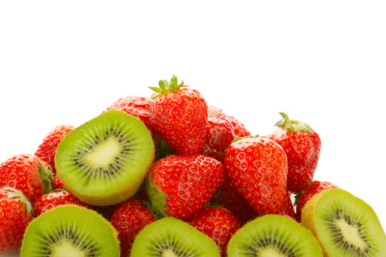 strawberries and kiwis heap isolated on white