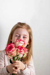 girl with a bouquet of pink roses