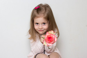 little girl with lollipop isolated on white