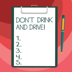 Text sign showing Don T Drink And Drive. Conceptual photo Do not take alcoholic drinks if you are driving Blank Sheet of Bond Paper on Clipboard with Click Ballpoint Pen Text Space