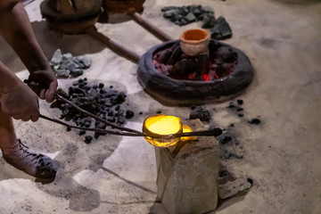Obraz na płótnie Canvas A blacksmith scene from stone age