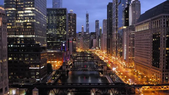 Chicago downtown buildings skyline aerial evening night drone flying 