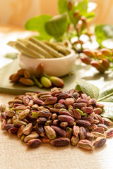 Sweet, delicate and fragrant nuts, Bronte pistachios with  brilliant green colour, ingredient for Italian cuisine, ice creams, cakes, pesto