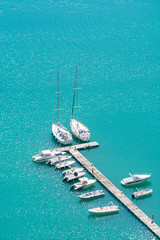 Sail boat in blue sea
