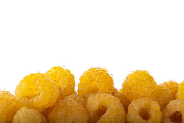 heap of yellow raspberries isolated on white background
