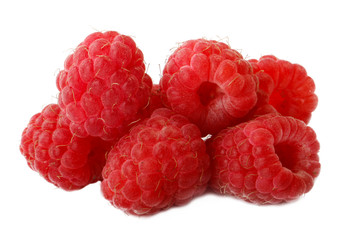 heap of red raspberries isolated on white background