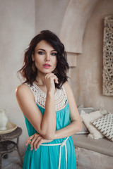 Woman posing in traditional morrocan living room