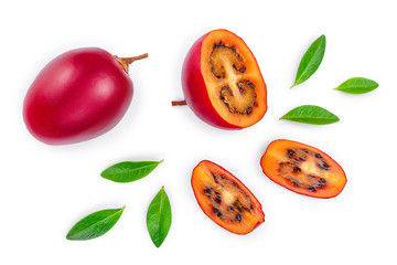 Fresh tamarillo fruit with leaves isolated on white background. Top view. Flat lay