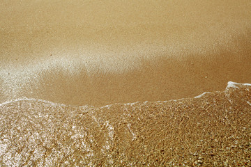 Soft wave on sandy beach