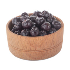 heap of black chokeberry isolated on white background