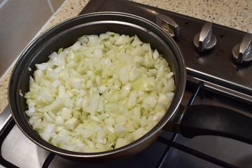 Fried onion in a pan