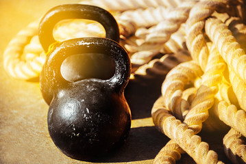 The concept of hard training in the gym, fitness, health and proper lifestyle. Two old scratched...