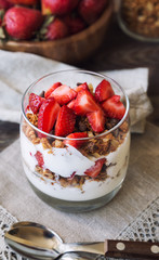 Granola parfait with yogurt and strawberries
