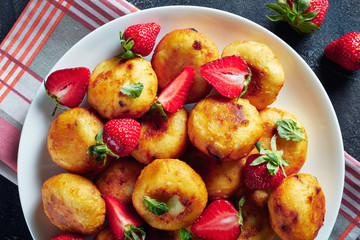 cottage cheese sweet donuts served with berries