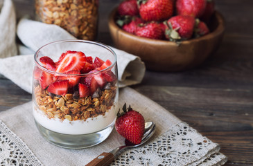 Granola parfait with yogurt and strawberries
