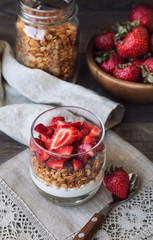 Granola parfait with yogurt and strawberries