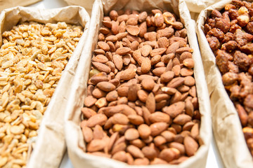 Almonds, cashews, peanuts, hazelnuts, pistachios. Eastern sweets. Asian cuisine.