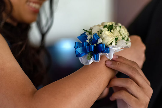 Corsage on female wrist - high school prom date