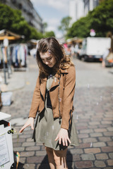 Fototapeta premium Girl playing around a town called berln