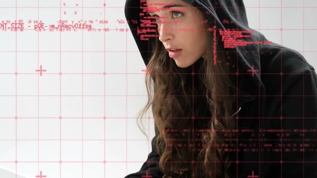 Female hacker using a laptop