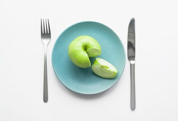 green apple on a plate