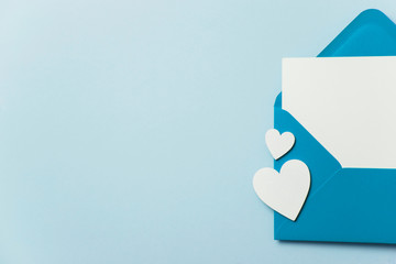 Father's Day card mockup. Blue envelope blank white card and hearts