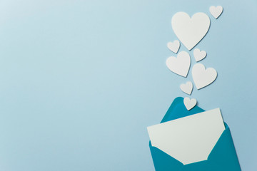 Father's Day card mockup. Blue envelope blank white card and hearts
