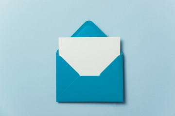 Blank white card with blue paper envelope template mock up - obrazy, fototapety, plakaty