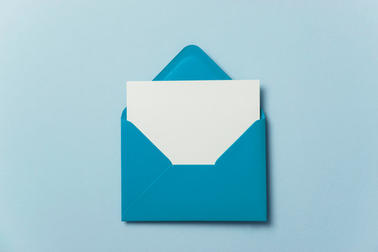 Blank white card with blue paper envelope template mock up
