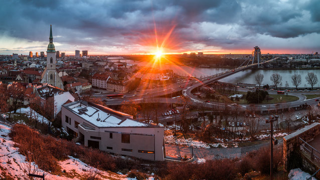 Cityscape of Bratislava, Slovakia with St. Martin's Cathedral and Danube River with New Bridge at Sunrise