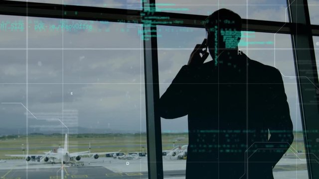 Silhouette of a man in an airport