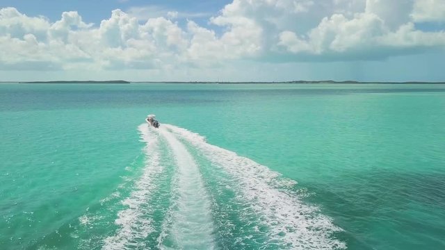 drone bird view of 2 boats in the bahamas. summer vaction