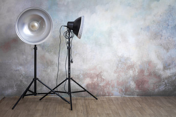 Professional lighting equipment in the photo studio on the original gray background