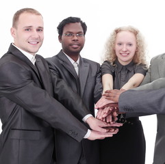 Business team showing union with their hands together forming a