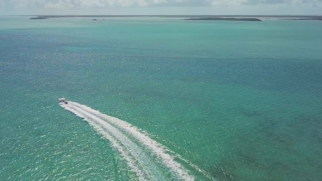 drone bird view of 2 boats in the bahamas. summer vaction