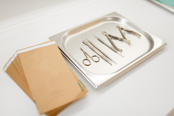 Fototapeta na wymiar Professional nail care equipment on a metal tray