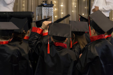 students graduate for school .children join graduation ball.