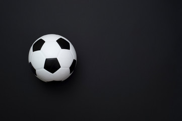 Fototapeta na wymiar soccer ball or football on black background