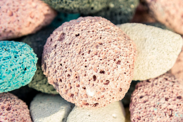 Multi-colored pumice stones for the whole frame. Selective focus