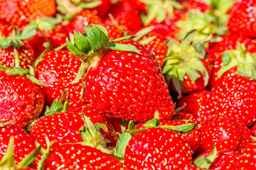 Strawberry. Fresh ripe red organic berries, macro. Fruit background