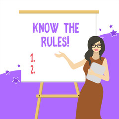 Handwriting text writing Know The Rules. Conceptual photo set explicit or regulation principles governing conduct White Female in Glasses Standing by Blank Whiteboard on Stand Presentation