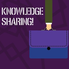 Text sign showing Knowledge Sharing. Business photo showcasing deliberate exchange of information that helps with agility Businessman Hand Carrying Colorful Briefcase Portfolio with Stitch Applique