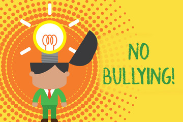 Writing note showing No Bullying. Business concept for stop aggressive behavior among children power imbalance Standing successful man suit necktie surging innovative solutions