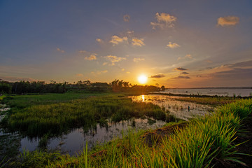 Beautiful sunsets on the banks of the river Indonesia in Java